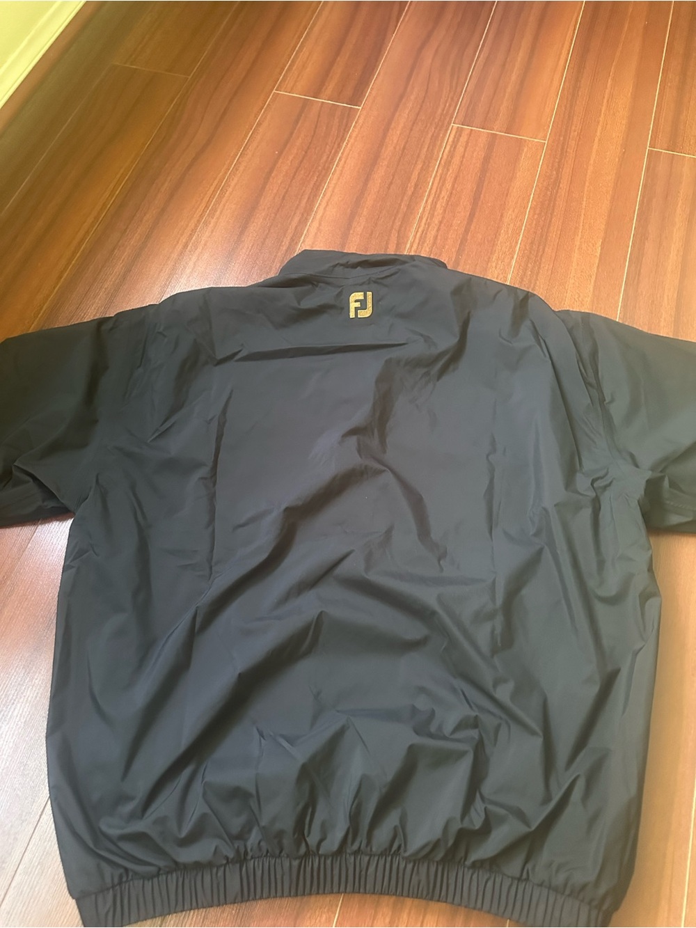 FootJoy Black Windbreaker with Gold FJ Logo